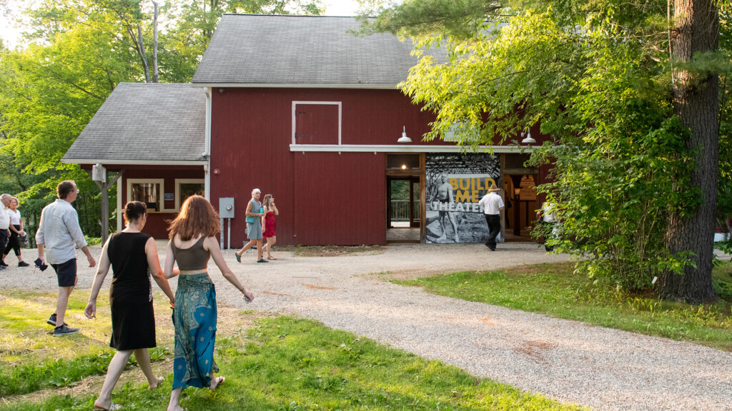 Patrons walking into Blake's Barn for Build Me a Theater exhibit