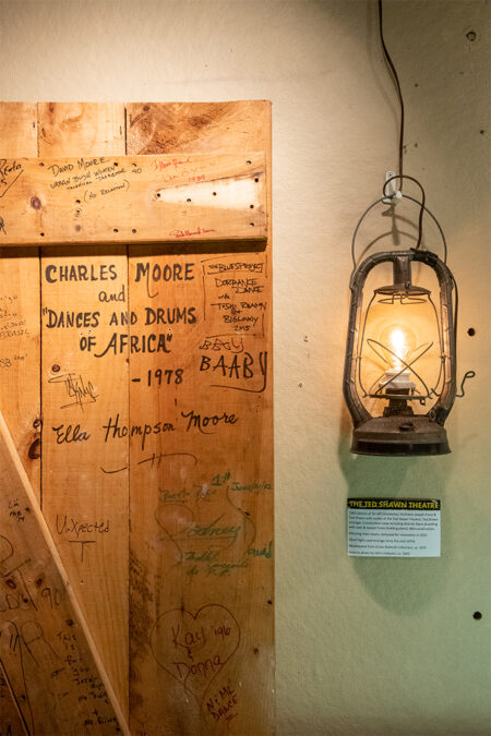 Close up of Ted Shawn Theatre dressing room door and ghost light