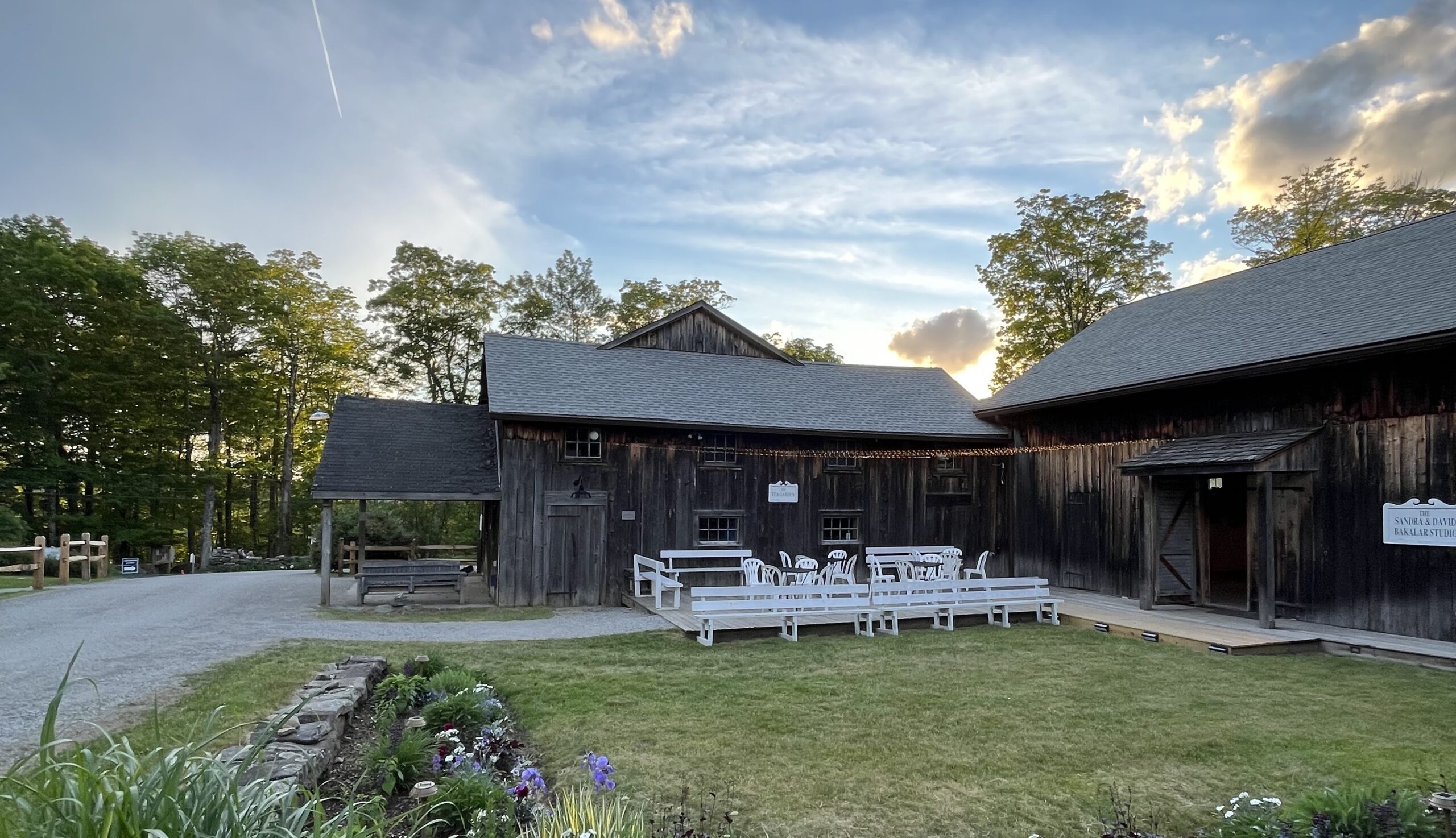A photo of the Jacob's Pillow Tea Garden below a bright blue sky.