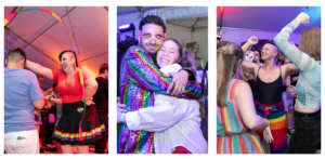 Three-panel collage of joyful moments at a Pride celebration under a large tent. Left panel: People dancing energetically, one person in a black tank top and rainbow skirt smiles with arms raised. Center panel: Two people embrace warmly; one wears a shiny rainbow jacket and light-up glasses, the other smiles brightly in a white jacket. Right panel: A person in a red top and rainbow-accented black skirt laughs while dancing with another person in a blue shirt. The festive atmosphere is highlighted with colorful lighting and decorations.